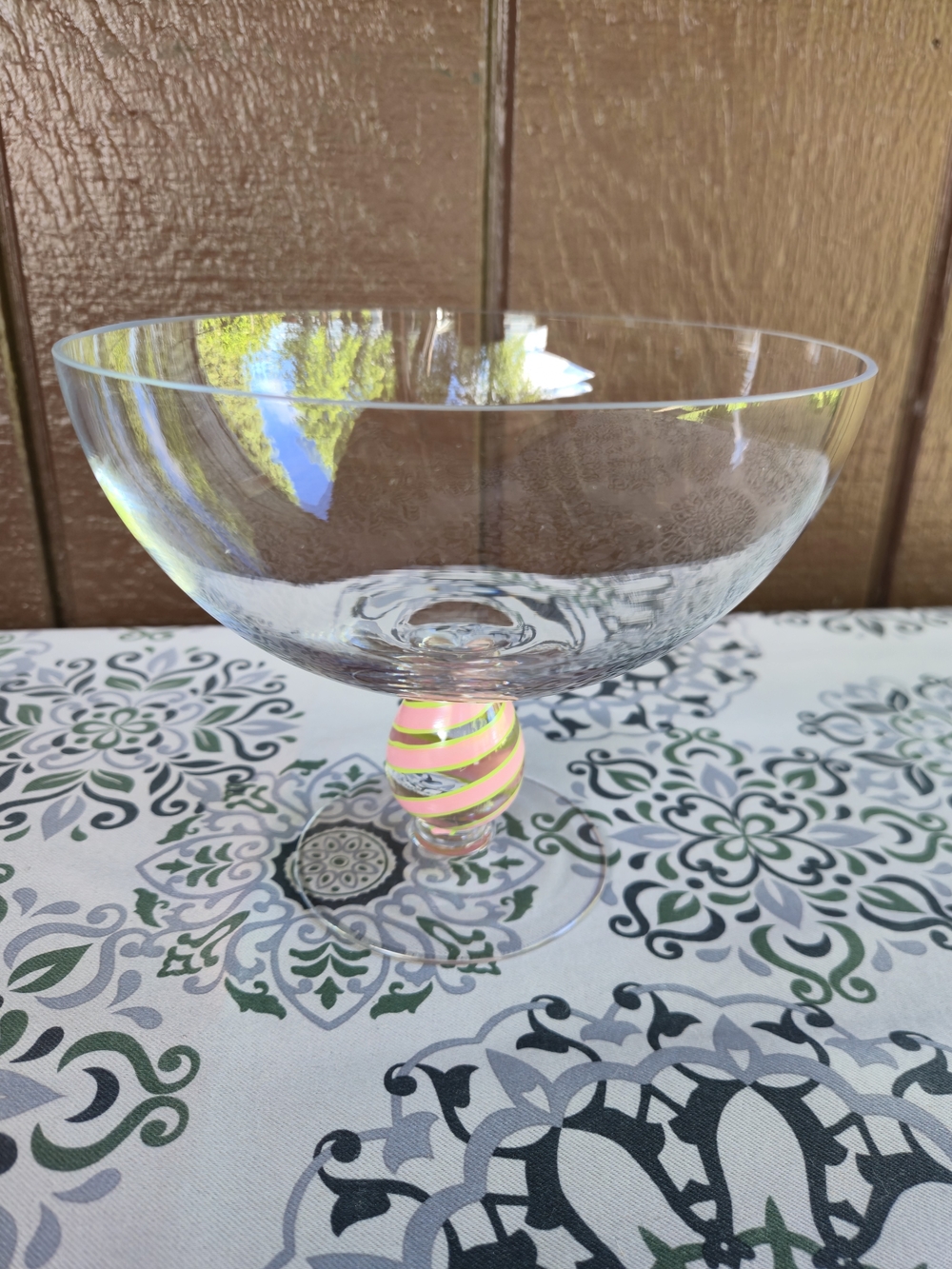Teleflora Decorative Glass Coupe with Striped Stem Accent